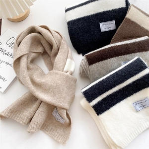 Long striped knit scarf for women with warm thick fabric and soft minimalist texture