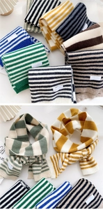 Detail of striped knitted scarves with ribbed edges and multiple color options
