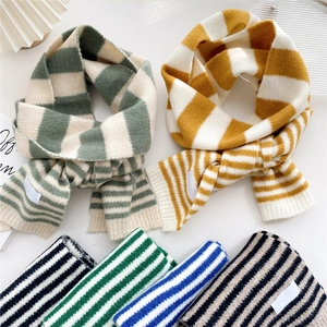 Thick knitted striped scarves for women in various colors with a soft winter texture