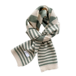 Knitted striped scarf for women with soft green and white yarn and ribbed edges