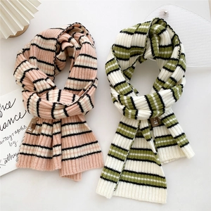 Winter striped knit scarf for women in pink, black, and white cozy rib-knit fabric
