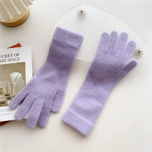 Close-up of lavender knit gloves with ribbed long cuffs and soft mohair texture