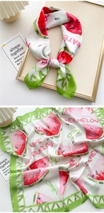 Detailed view of silk-feel square scarf featuring vibrant watercolor watermelon patterns