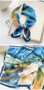 Detailed view of silk square scarf with Impressionist oil painting print and smooth texture