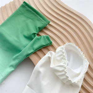 Gradient ice silk sun protection sleeves for women in bright green and cream colors
