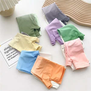Colorful gradient ice silk sun protection sleeves stacked on a white minimalist background