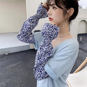 Floral cooling sun protection sleeves with blue leaf pattern and elastic cuffs for outdoors