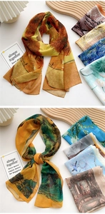 Detailed close-up of Van Gogh art print silk scarves on a minimalist wooden decor