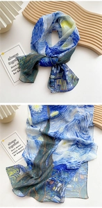 Detail of artistic Van Gogh Starry Night print silk scarf with fine stitching and soft texture