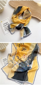 Detail of ginger silk scarf featuring vintage floral prints and pine needle patterns