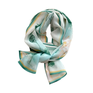 Long silk scarf with lotus print and yellow border for sun protection and style