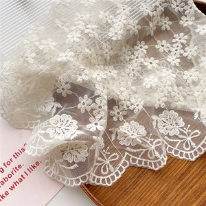 White floral hollow lace triangle scarf with daisy embroidery and wave edges