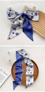 Double-sided floral skinny scarf with elegant typography on navy blue silk fabric