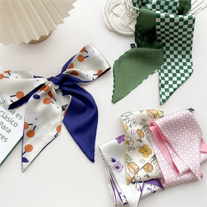 Narrow silk scarf collection with floral, checkerboard, and cherry prints for women