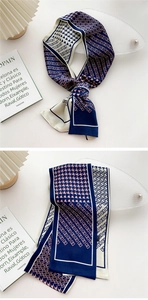 Detail of slim silk-feel twilly scarf with houndstooth and geometric prints in navy blue