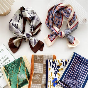 Elegant printed silk scarf assortment in six stylish patterns with glossy satin finish