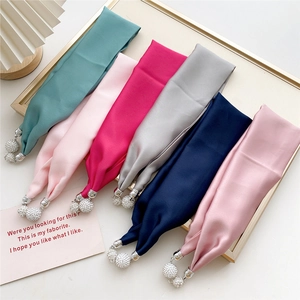 Satin silk magnetic scarves in six colors with rhinestone metal charms display