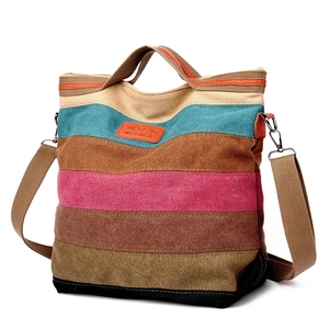 Canvas tote bag with colorful horizontal stripes and adjustable shoulder strap for women
