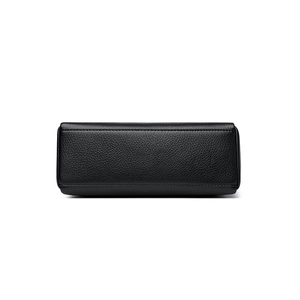 Bottom view of black litchi grain leather shoulder bag with precision stitching