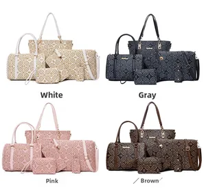 Gros plan d'ensembles de sacs cabas vintage en blanc, gris, rose et marron, vue détaillée