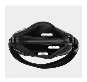 Vue de dessus du sac bandoulière noir avec deux compartiments zippés et poches internes