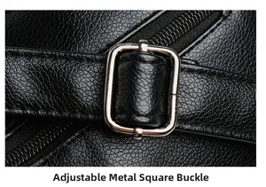 Détail macro de la boucle en métal réglable sur un sac bandoulière en cuir noir