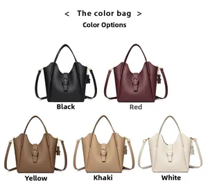 Detailed view of color options for leather bucket bags featuring top handles and straps