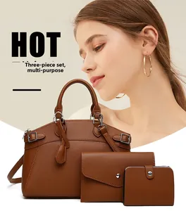 Detailed view of 3-piece dark brown litchi pattern leather tote bag and pouches