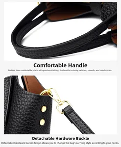 Detail view of black lychee leather handle with gold hardware and precision stitching