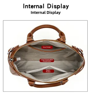 Internal view of tote bag showing spacious compartments and zip pocket in brown leather