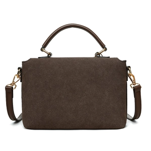 Front view of a dark brown suede messenger bag with smooth leather handles and gold hardware