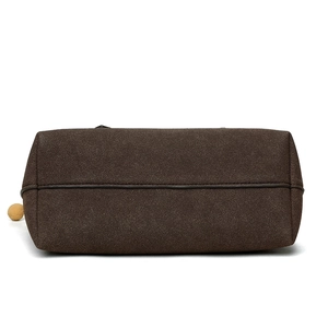 Bottom view of dark coffee suede messenger bag with reinforced stitching and soft texture