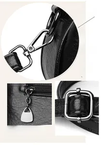 Dettagli hardware in argento e pelle a grana di litchi su una borsa a mano nera chic