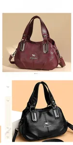 Dettagli di borse in pelle martellata con logo a canguro metallico in bordeaux e nero