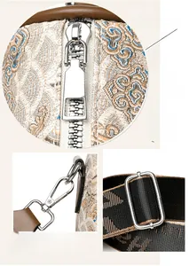 Detailed view of embroidery jacquard texture with silver hardware and logo shoulder strap