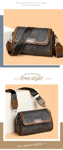 Detail of vintage wave pattern embroidery and branded jacquard strap on a luxury bag