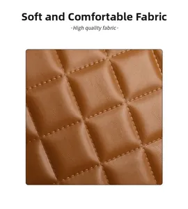 Macro shot of dark brown quilted leather texture with classic diamond stitching patterns