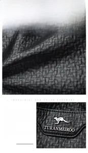 Macro detail of lychee textured leather and industrial gunmetal logo on shoulder bag