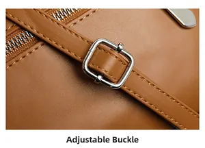 Close-up of brown leather strap with adjustable silver buckle and stitching details
