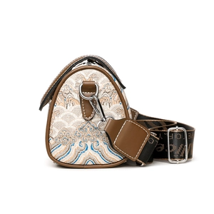 Embroidered Boston bag in ivory brocade with brown leather trim and wide woven strap