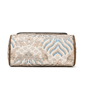 Retro Chinese style cylinder bag with traditional embroidery and brown leather trim