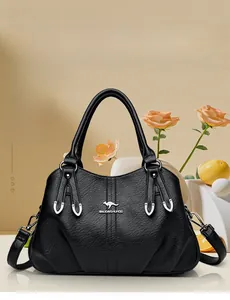 Close-up of black lychee texture leather handbag with metal kangaroo logo and handles