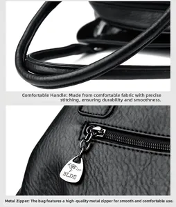 Detail of the litchi pattern leather handbag showing precise stitching and silver zipper pulls
