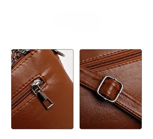 Detailed macro view of brown leather bag showing pebbled texture and metal zipper