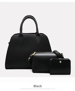 Three-piece black pebbled leather bag set including tote, crossbody bag, and wallet