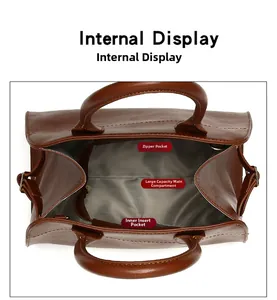 Internal display showing the spacious compartments and zippered pocket of the brown tote bag