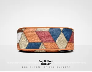Detailed close-up of multi-colored textured leather bottom with reinforced edge stitching