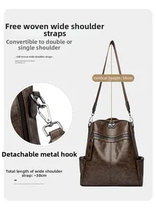 Detail view of coffee vintage leather bag with high-quality metal hooks and zippers