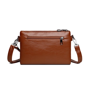 Deep brown faux leather shoulder bag with lychee texture and metallic zip pockets
