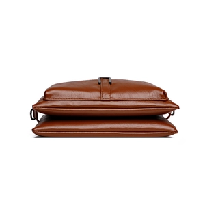 Chic brown multi-layered shoulder bag in glossy PU leather with dark grey metallic buckle